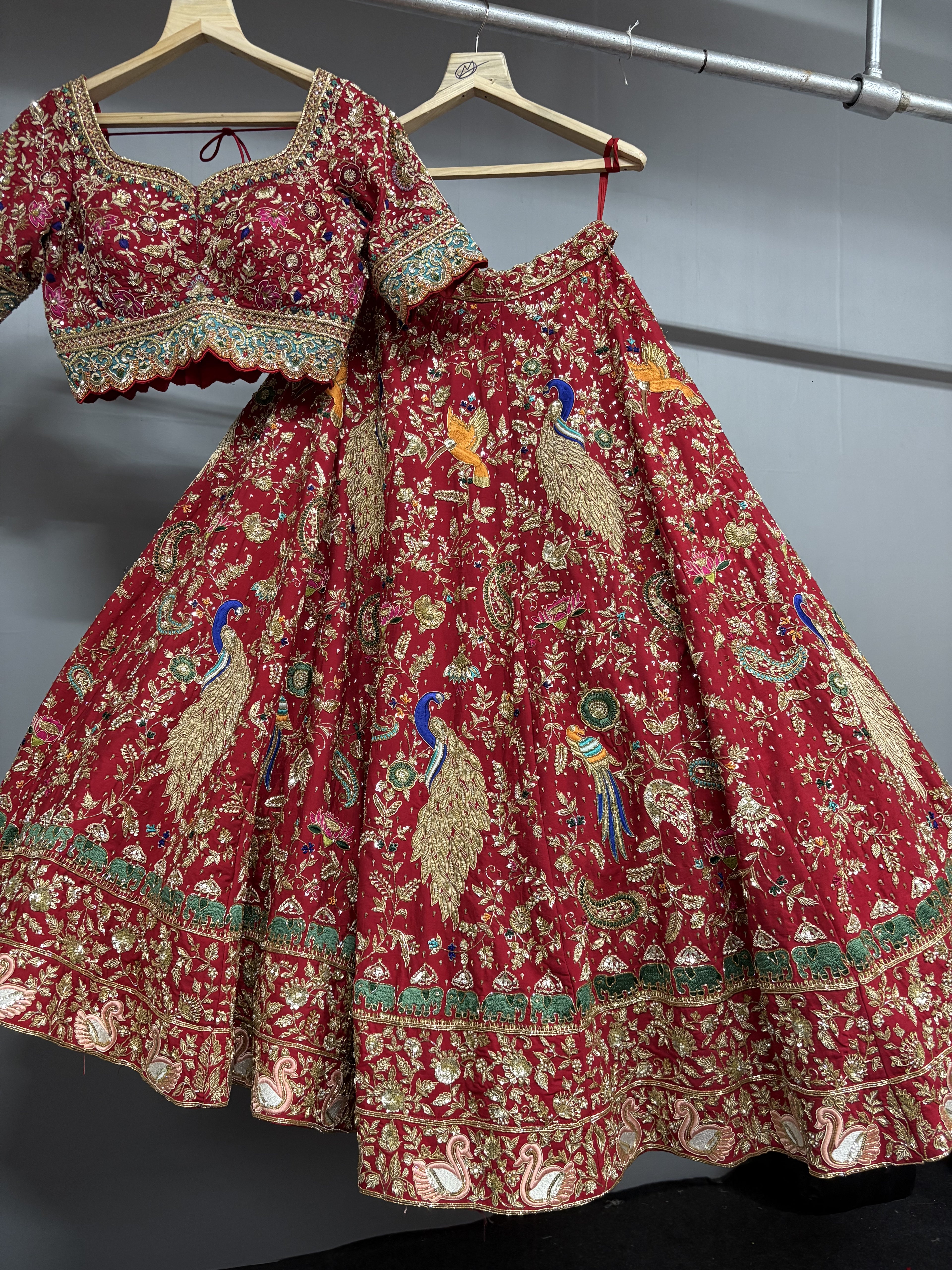 Rajkumari Red Peacock Hand Embroidered Bridal Lehenga