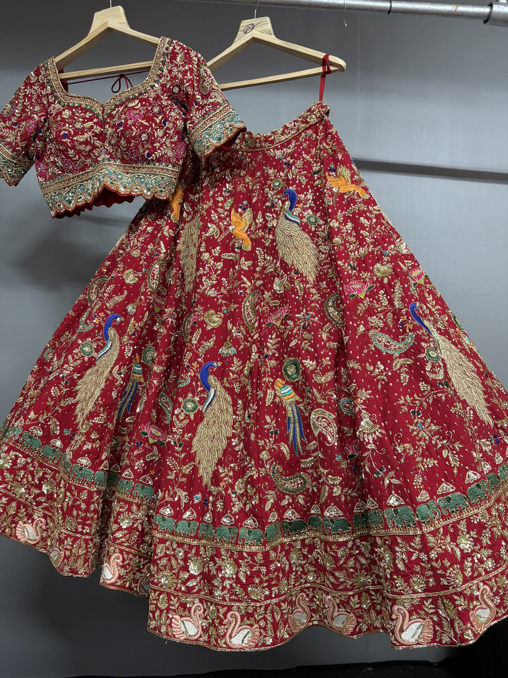 Rajkumari Red Peacock Hand Embroidered Bridal Lehenga